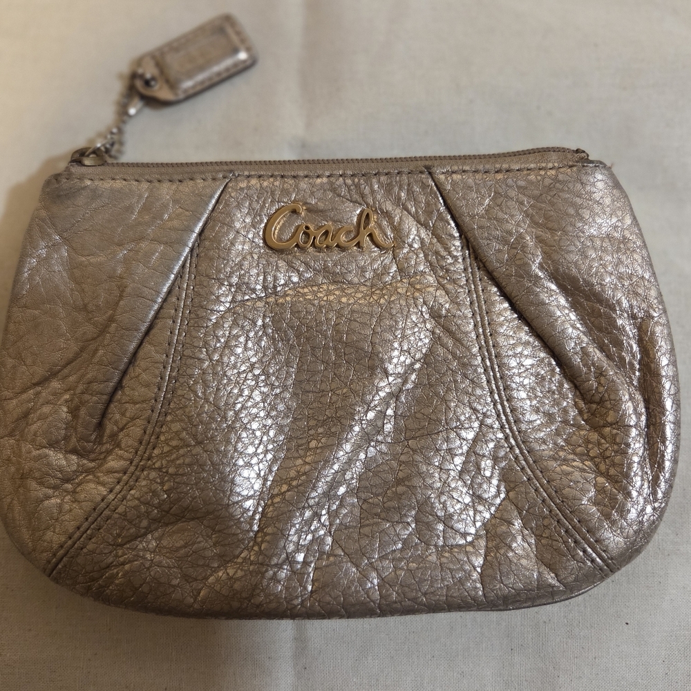 Coach ROSE GOLD pouch w/o wristlet strap